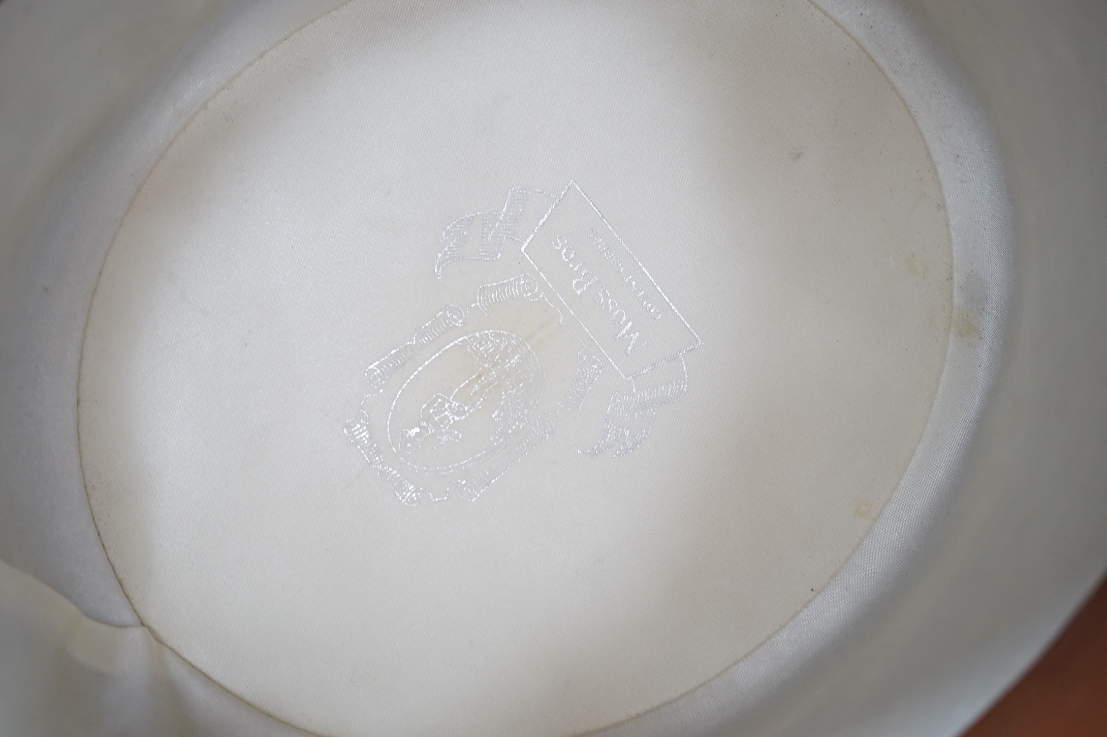 A Moss Bros grey top hat in Harrods box